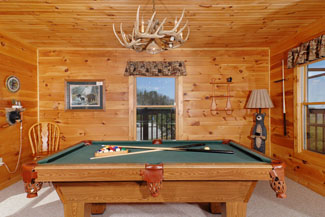 Pigeon Forge Two Bedroom Cabin Featuring a large open pool table area